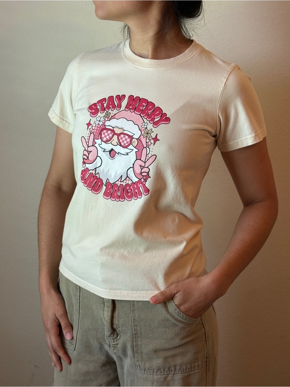 Stay Merry and Bright Santa Graphic Tee 100% Cotten- Cream with Pink Print